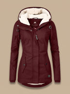 Madison | Chaqueta impermeable con forro polar, capucha y cremallera para mujer